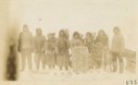 Image of Eskimos [Inuit] visiting